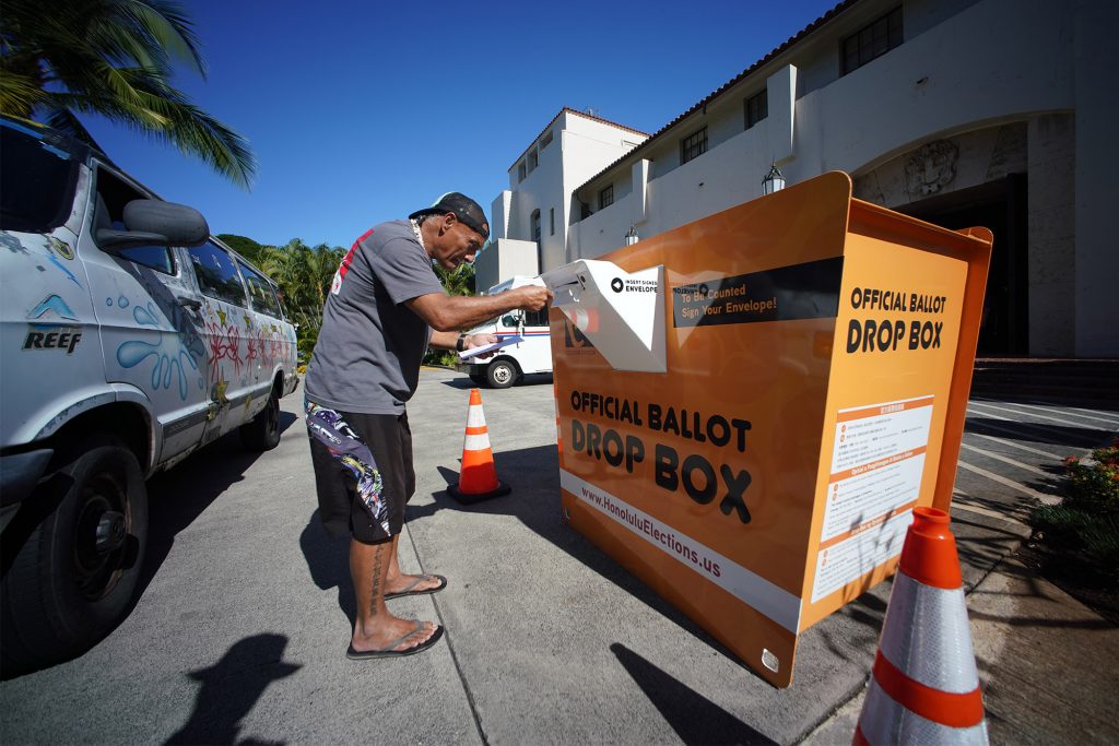 Clyde Kaahanui from Papakolea drops off ballots at Honolulu Hale.