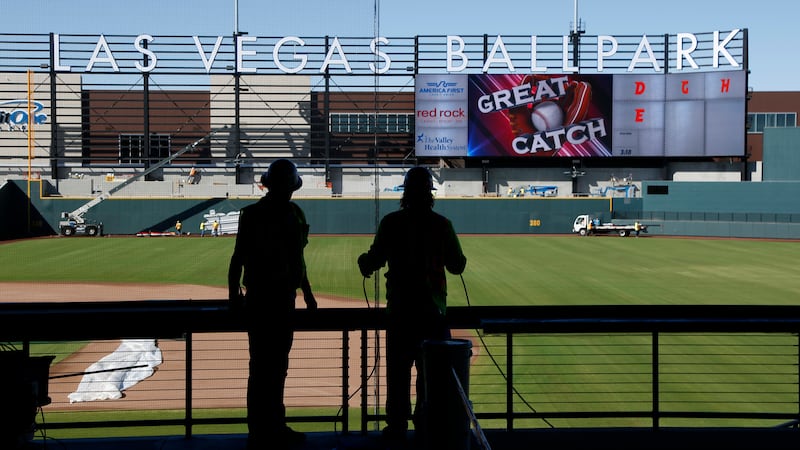 Workers continue construction on a new baseball park in Las Vegas on March 28, 2019. The...