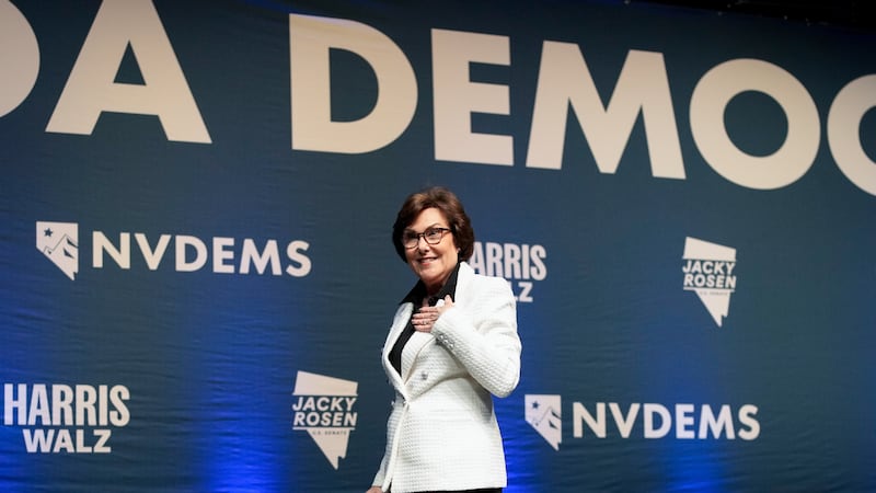 Sen. Jacky Rosen, D-Nev., reacts to the crowd after speaking to supporters during an election...