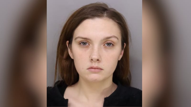 Authorities said 20-year-old Cloe Workman is accused of spitting onto her child’s face and...