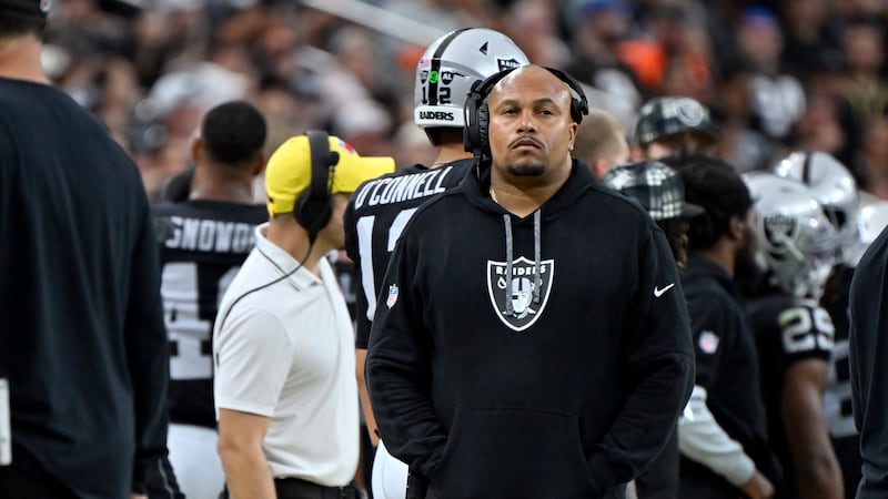 Las Vegas Raiders head coach Antonio Pierce looks on during an NFL football game against the...