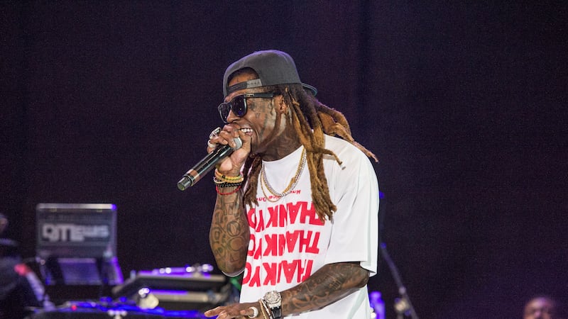 Lil Wayne performs at the Lil' WeezyAna Fest at Champions Square on Friday, Aug. 25, 2017, in...