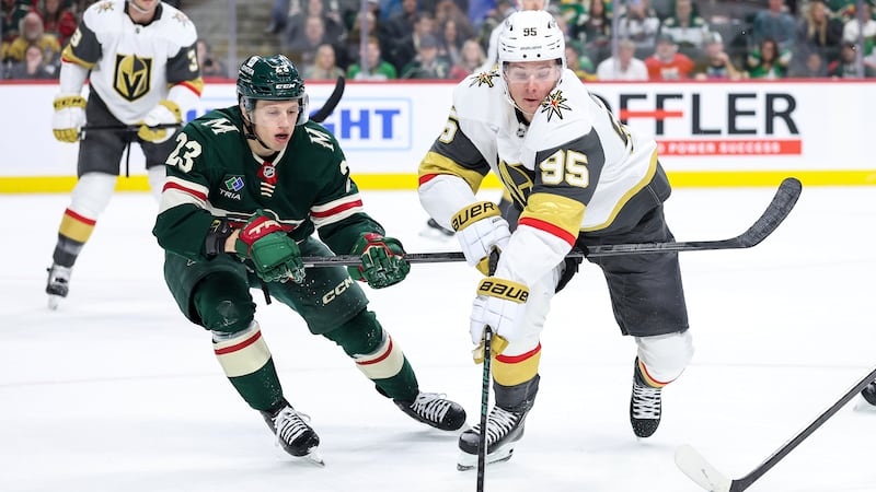 Vegas Golden Knights right wing Victor Olofsson, right, and Minnesota Wild center Marco Rossi...