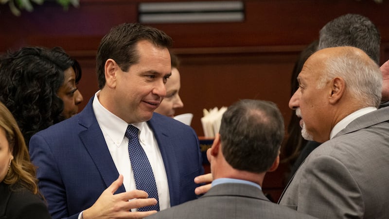 FILE - Nevada Secretary of State Cisco Aguilar talks with Lt. Gov. Stavros Anthony during the...