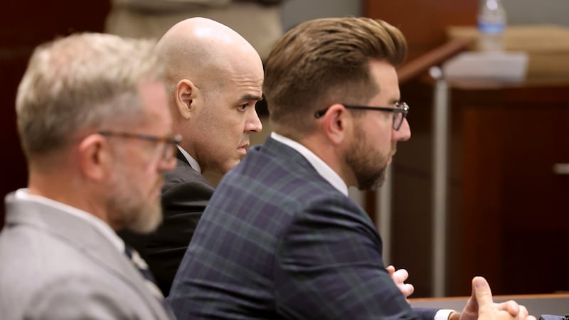 Robert Telles, center, waits in the courtroom for the verdict in his murder trial at the...