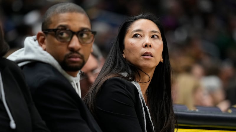 FILE - Las Vegas Aces assistant coach Natalie Nakase, right, and interim head coach Tyler...