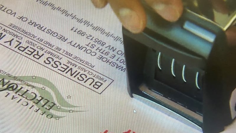 Ballot being stamped at registrar of voters office