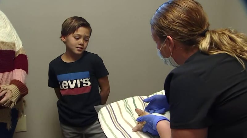 Zayin Berry, 8, now has an inseparable bond with his new best friend, Peaches.