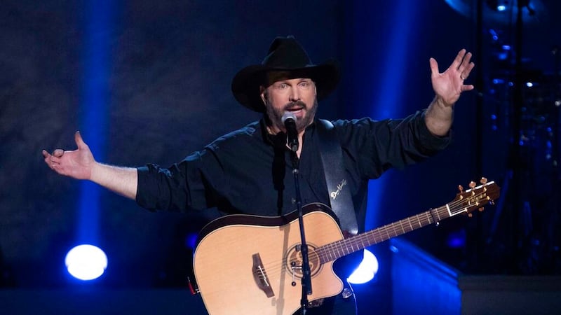 FILE - In this March 4, 2020, file photo, country star Garth Brooks performs on stage during...