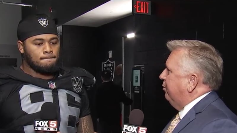 FOX5's Kevin Bolinger speaks to Las Vegas Raiders' Jonah Laulu after the team's...