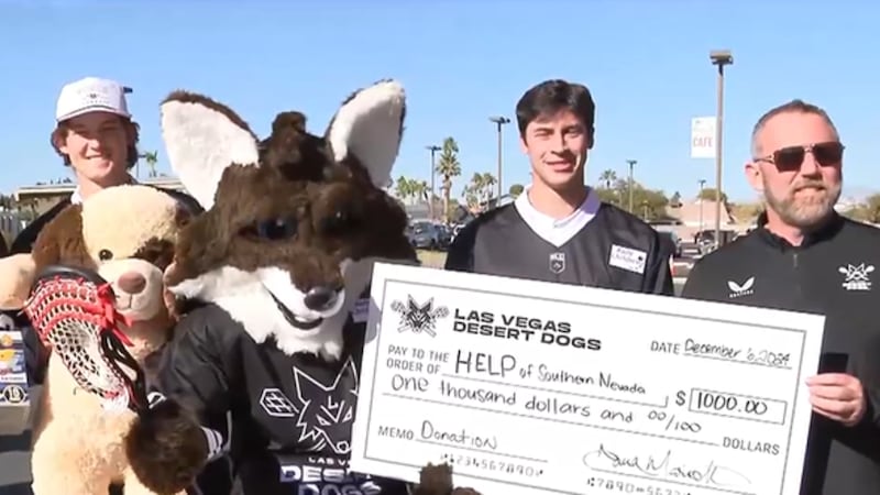 The Las Vegas Desert Dogs donated to a toy drive before the team's home opener.