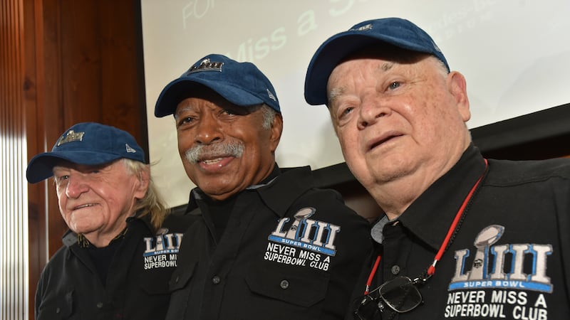 FILE - Members of the Never Miss a Super Bowl Club, from the left, Tom Henschel, Gregory...