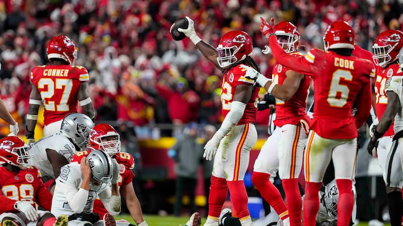 Kansas City Chiefs linebacker Nick Bolton (32) holds the recovery ball after a fumble by the...