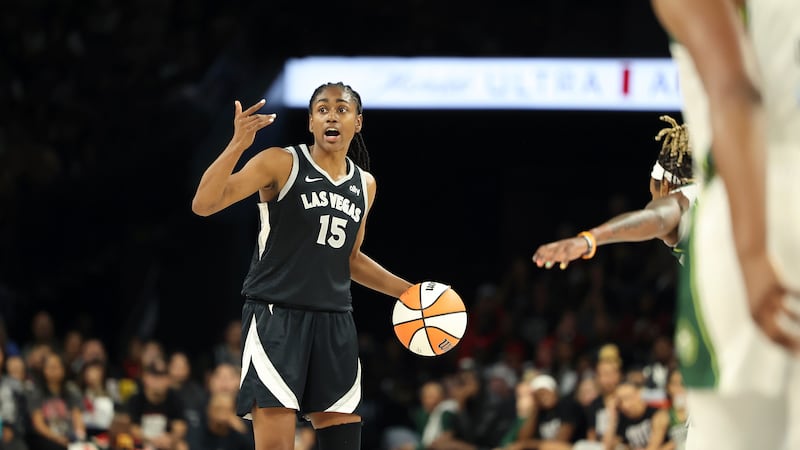 Las Vegas Aces guard Tiffany Hayes (15) signals during a first-round WNBA basketball playoff...