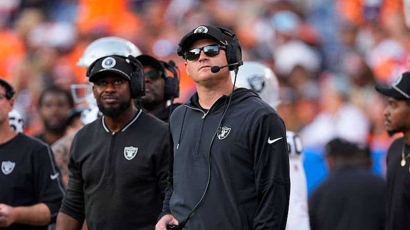 FILE - Las Vegas Raiders offensive coordinator Luke Getsy looks on in the second half of an...